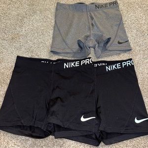 3 pairs of nike pro shorts